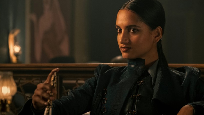 Image of a South Asian woman with a knife in her hand from the Shadow and Bone TV show